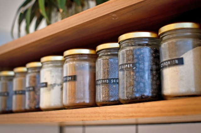 An image of a row of spice jars