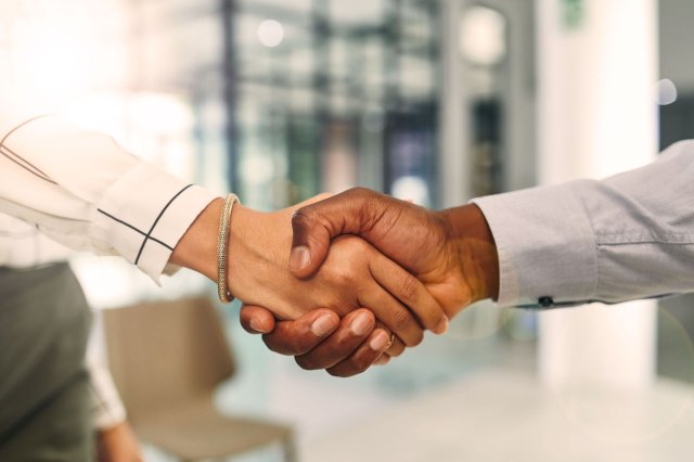 An image of two hands shaking