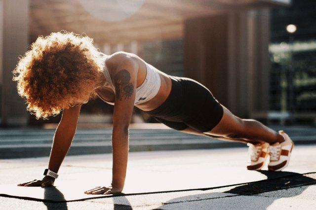 An image of a woman doing a plank