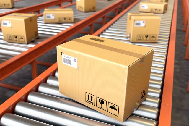 An image of cardboard boxes on a conveyor belt