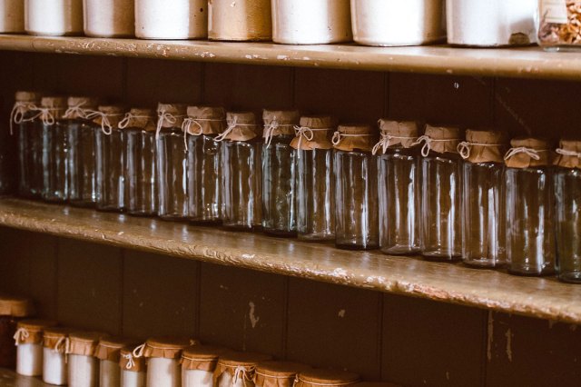 An image of a store shelf lined with jars