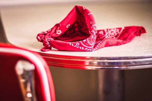 An image of a red bandana on a table