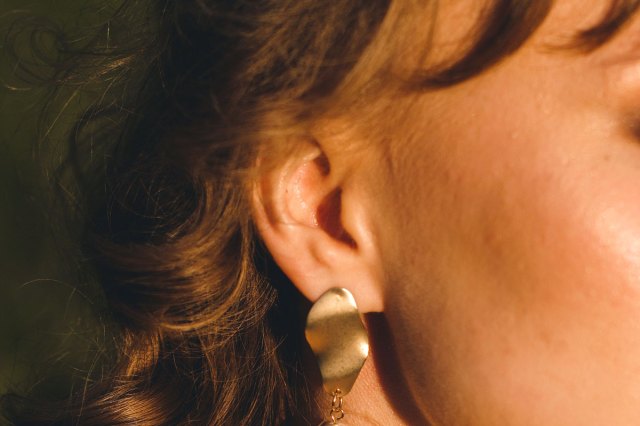 A close-up image of woman's ear
