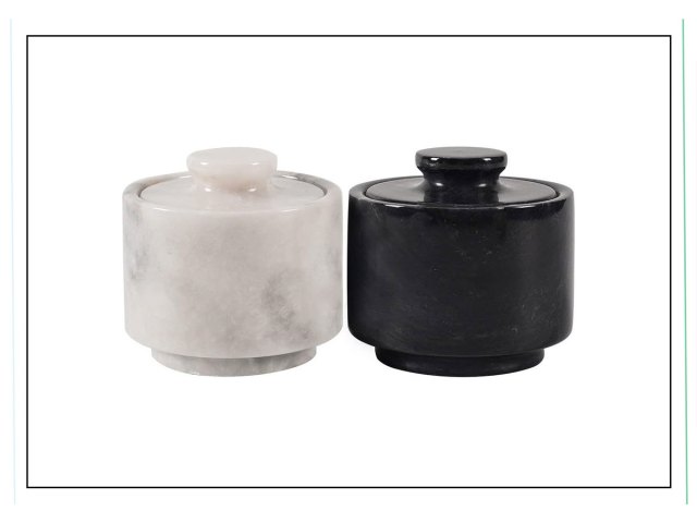 An image of marble salt and pepper bowls