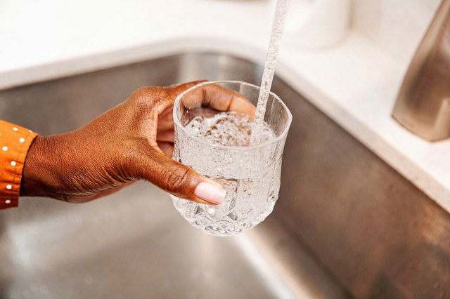 An image of a glass of water being filled