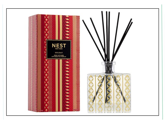 An image of a red box and a reed diffuser