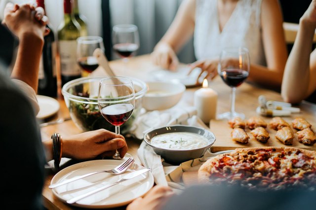 An image of people having dinner at a restaurant