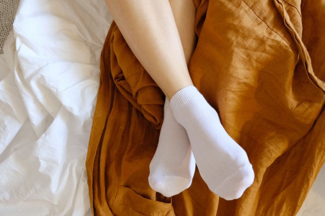 An image of a person wearing white socks
