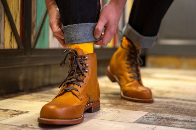 An image of a man in brown boots