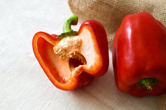 An image of two red peppers