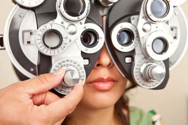 An image of a woman getting an eye exam
