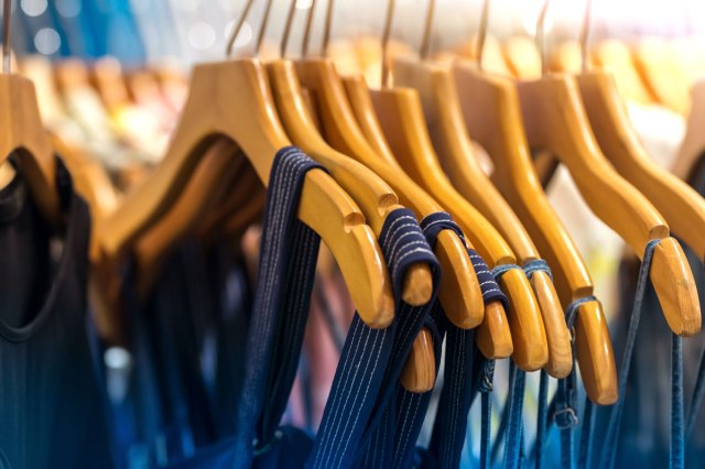 An image of clothes on hangers