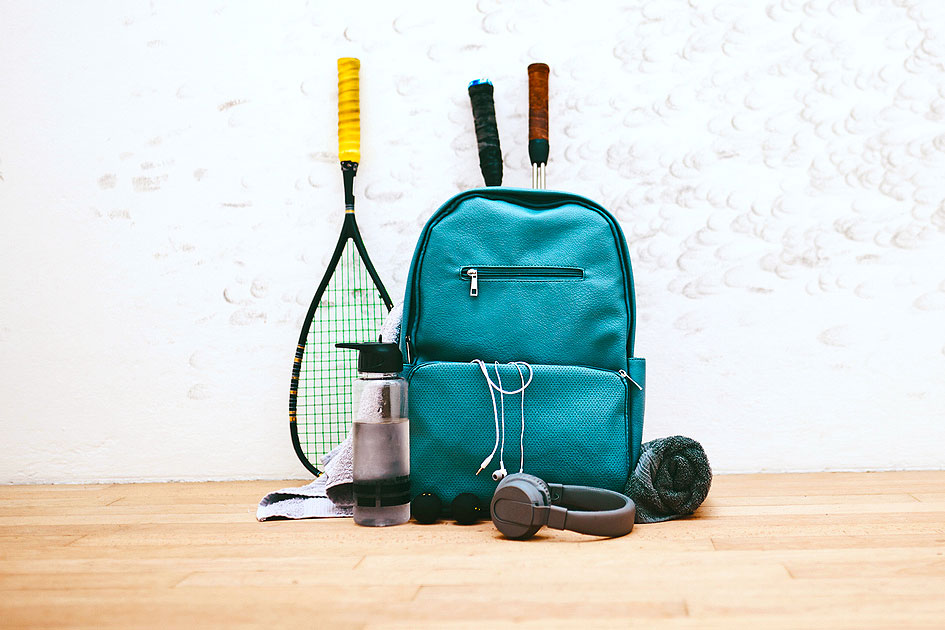 An image of a teal backpack with sports gear