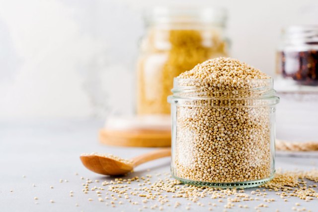 An image of a jar of dry quinoa