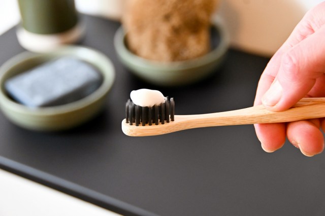 An image of a toothbrush with toothpaste on it