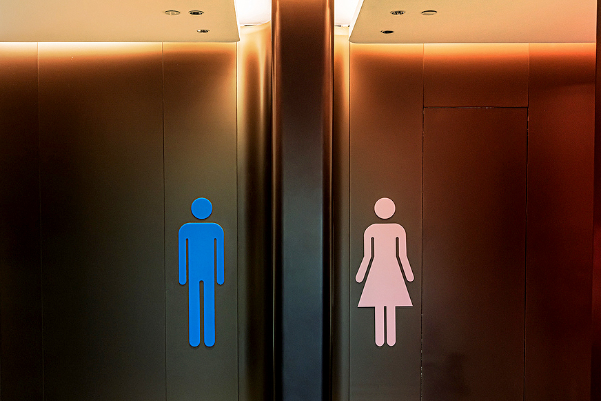 An image of a man and a woman silhouette illustrations for the restroom 