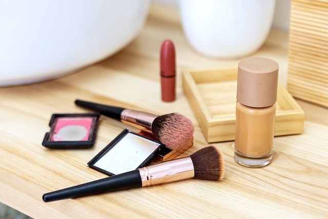 An image of makeup and brushes