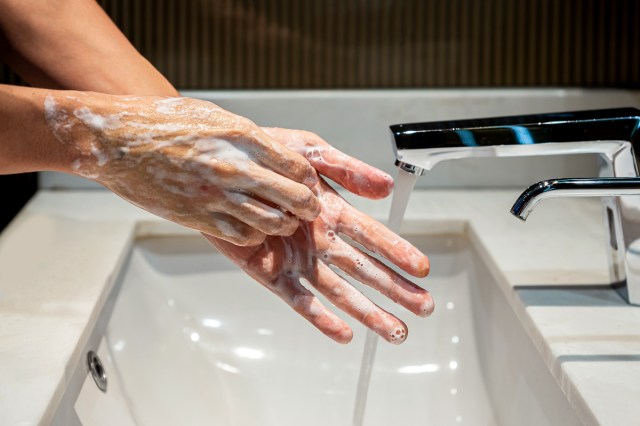 An image of a person washing their hands