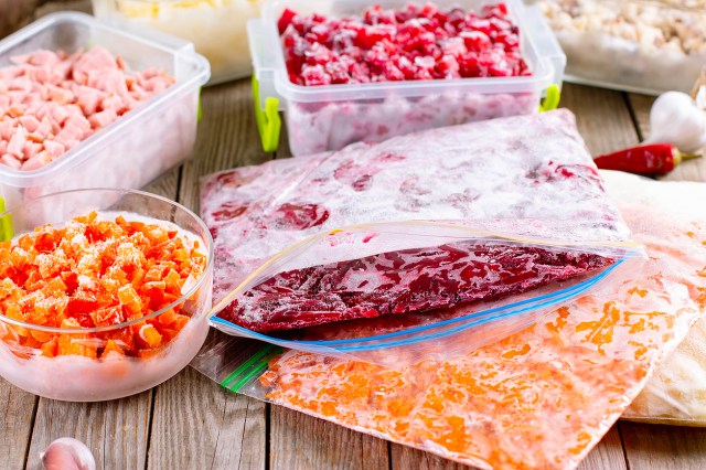 Frozen foods stored in plastic containers and plastic bags