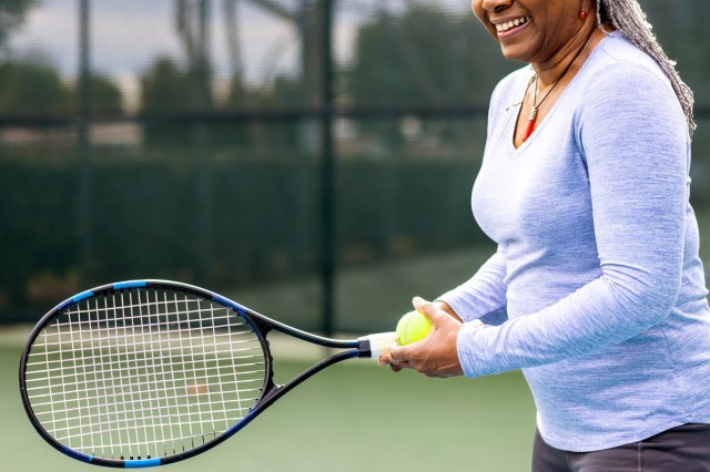 An image of a woman playing tennis