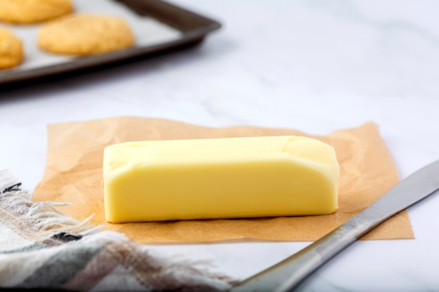 An image of a stick of butter and knife