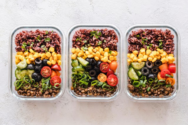 An image of three containers of food