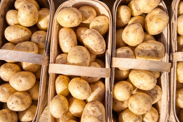 An image of baskets of potatoes
