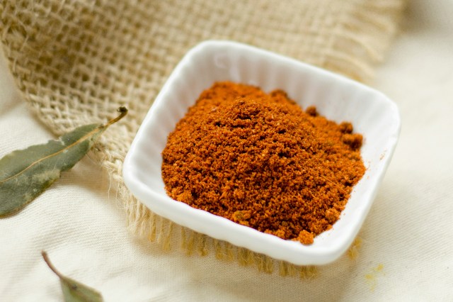 An image of spices in a white dish