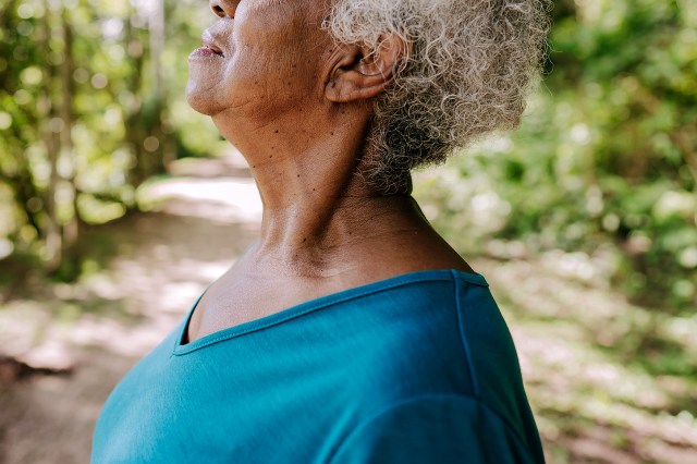 An image of a woman in the woods