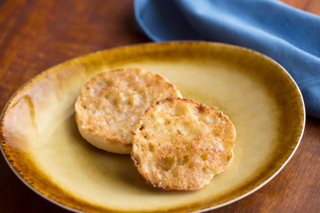 An image of a toasted English muffin on a plate
