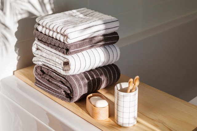 An image of a pile of bathroom towels