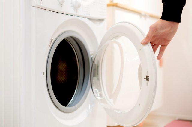 An image of a dryer with an open door