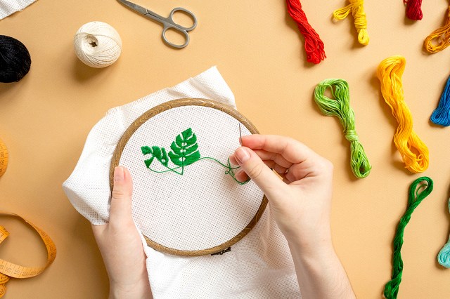 An image of person embroidering 