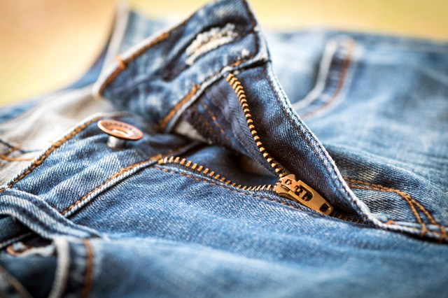 An image of a pair of jeans with the zipper open