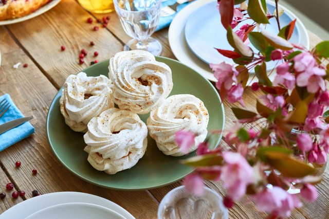 An image of meringue cookies on a plate
