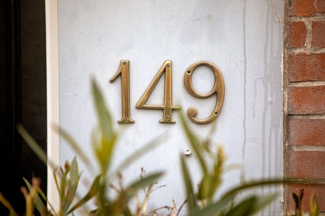An image of numbers on the side of a house