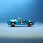 Hot Wheels toy Ford Mustang in blue with the number 67 on the side