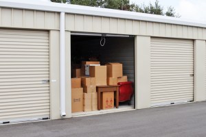 Storage unit with door open so you can see stacked boxes