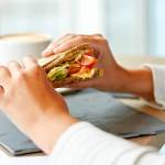 Person holding a sandwich in both hands