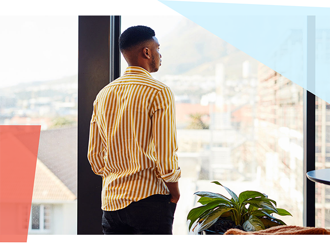 Man standing in front of window 