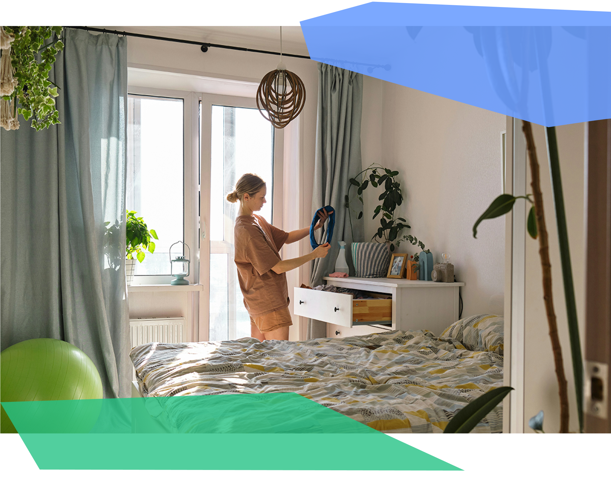 Woman in bedroom looking through objects in drawer 