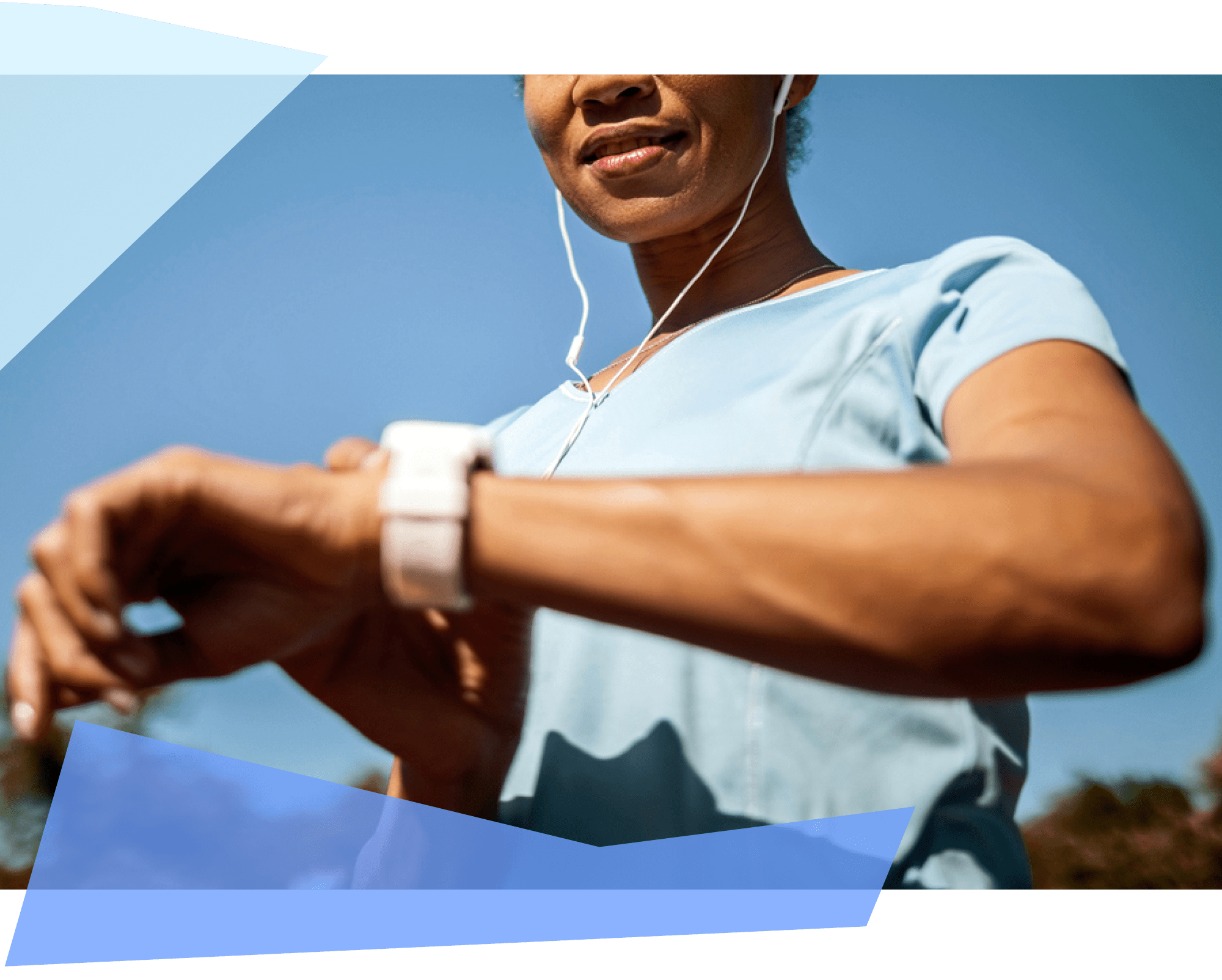 Woman working out and looking at her watch 