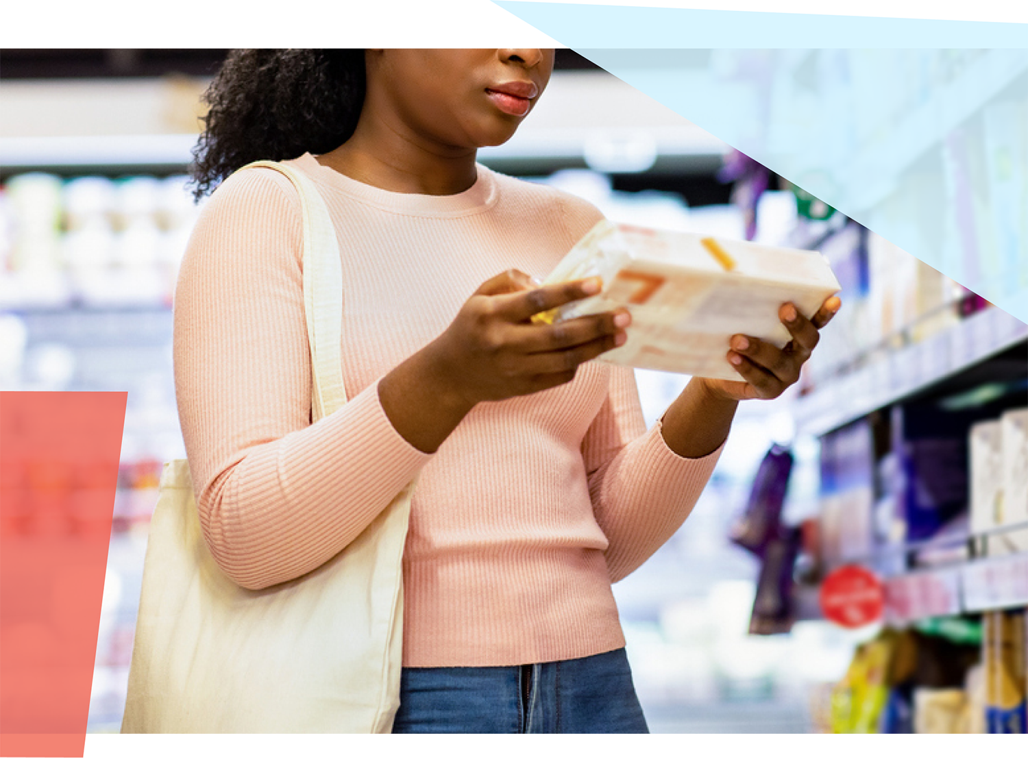 A woman reading a food package at the grocery store 