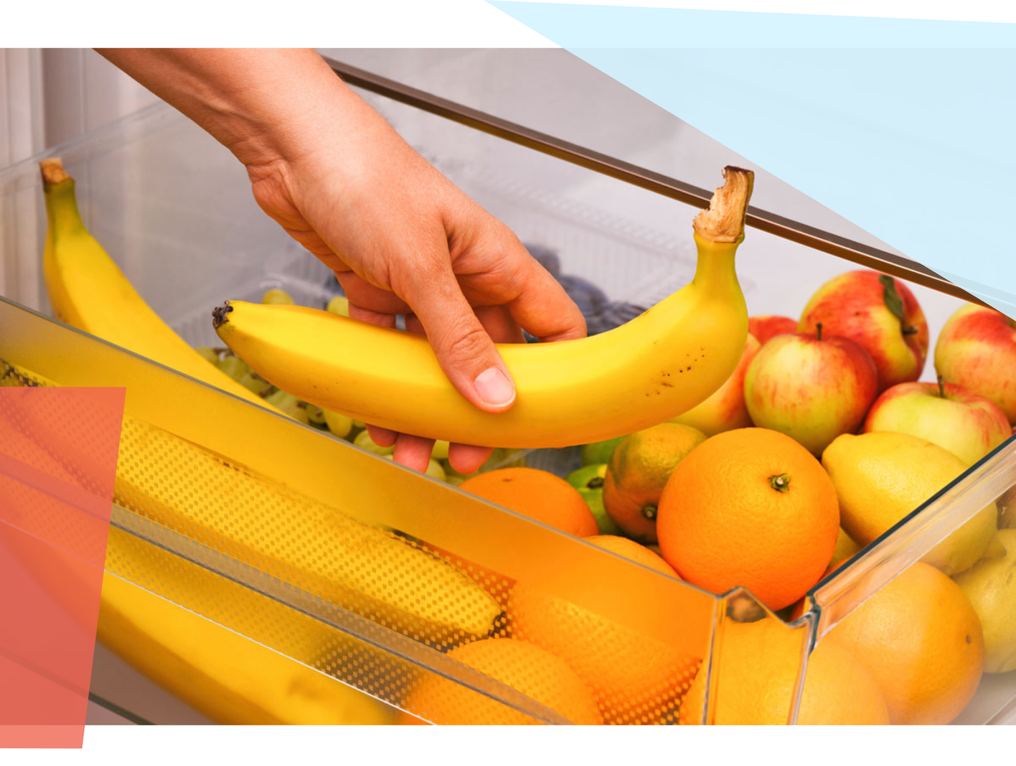 Someone picking up a banana out of a fruit drawer 
