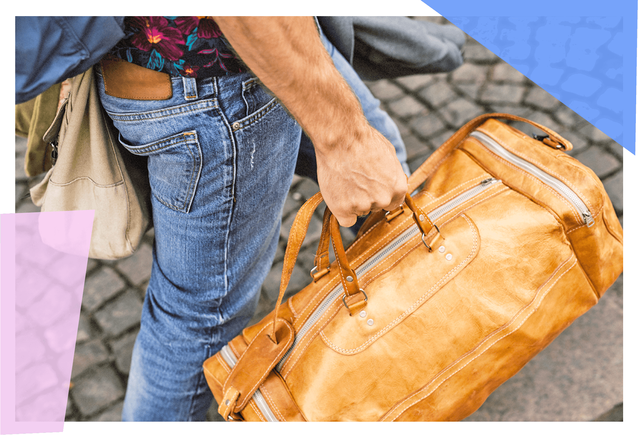 Man carrying a tan weekender bag. 