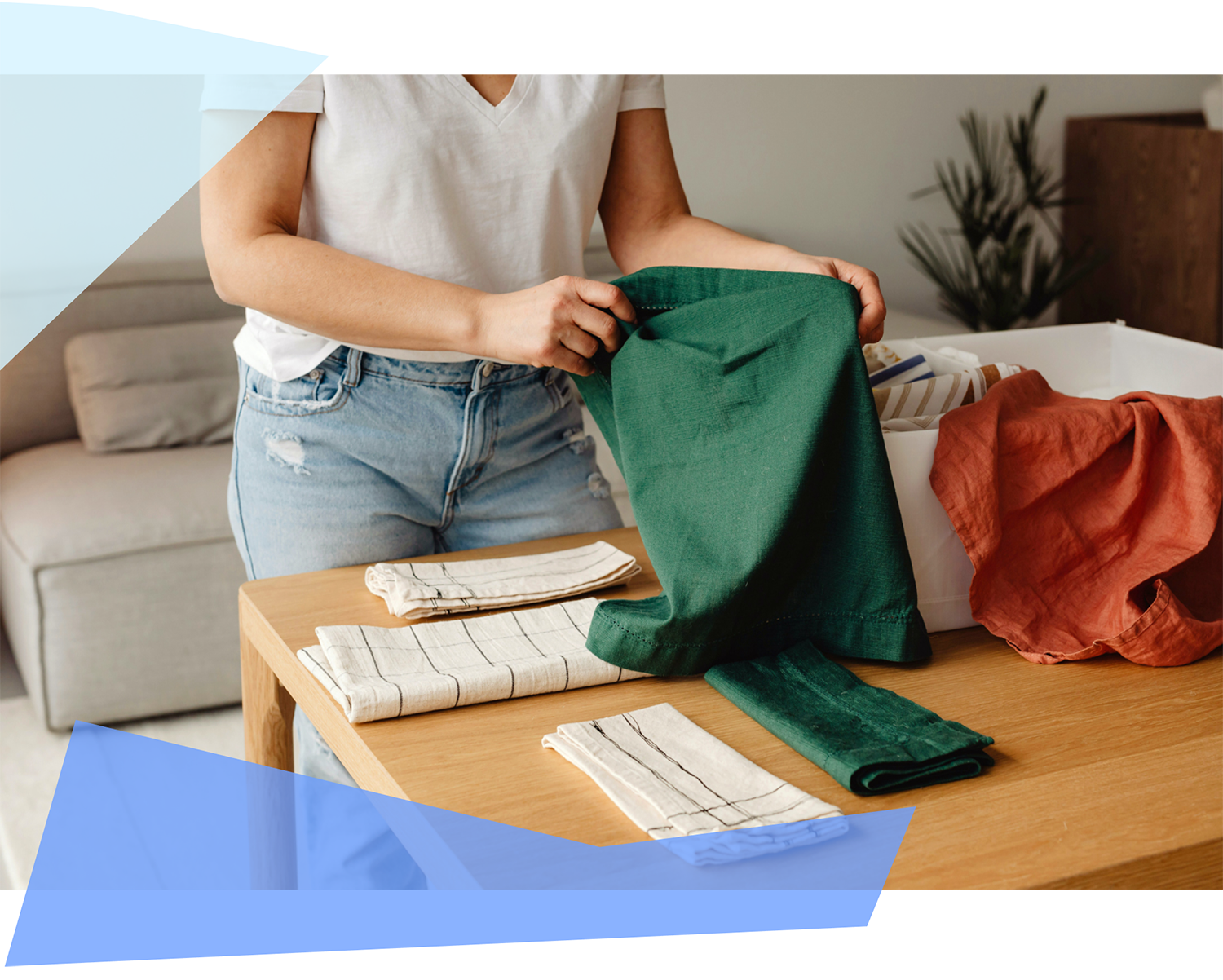 Woman folding laundry. 