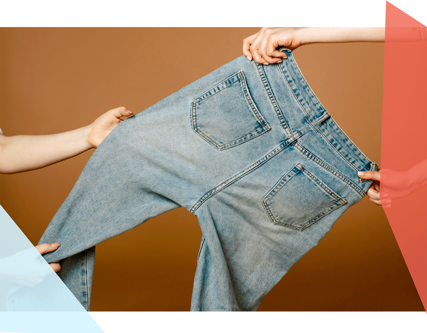 Two people pulling on a pair of jeans. 
