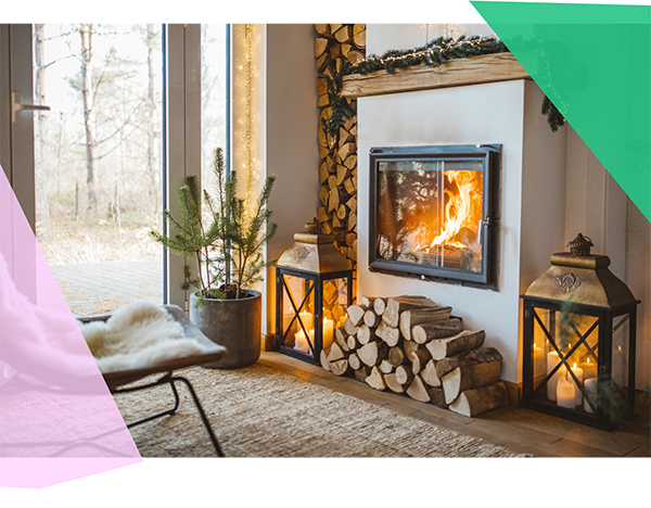 A cozy living room with a fire in the fireplace 