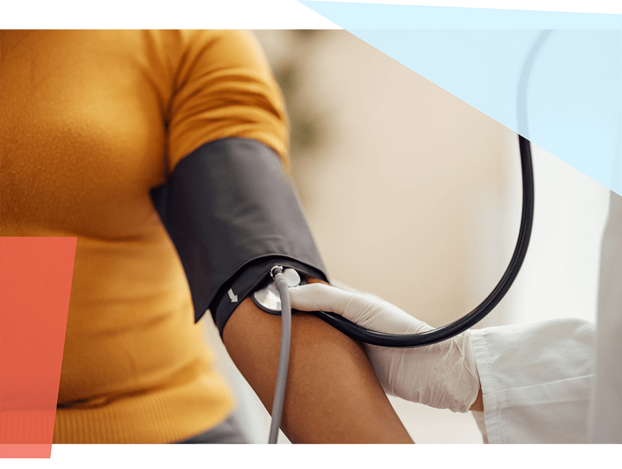 Woman getting blood pressure checked 