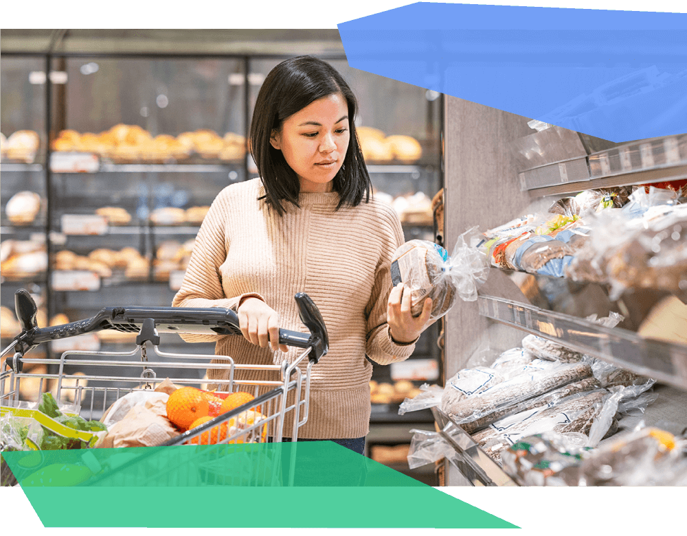 Woman checking bread bags at the grocery store